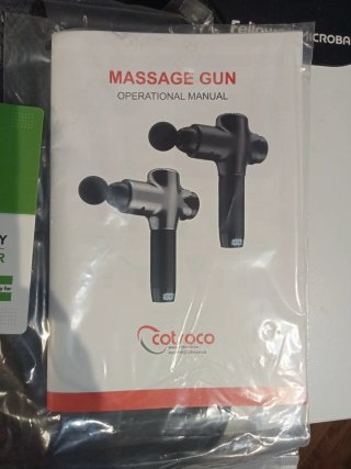 Pistola de masaje Cotsoco con bolsa y sin uso