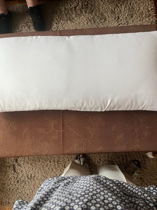 Almohada de fibra blanca