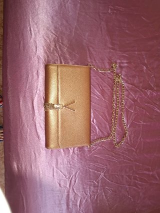 Bolso Valentino Oro Rosa Cadena y Tassel