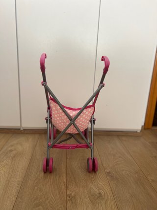 Cochecito de muñecas rosa lunares