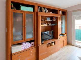 Mueble de salón madera y cristal