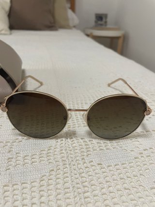 Gafas de sol mo marrones y doradas