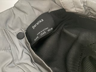 Chaqueta reflectante con bolsillos