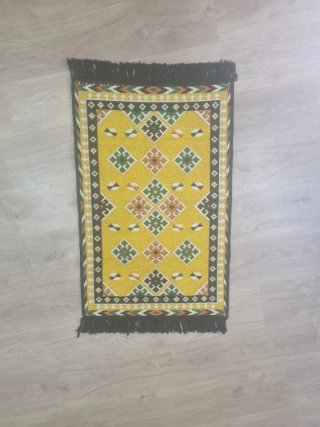 Alfombra étnica amarilla flecos 105x60cm