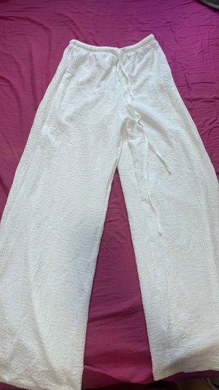 Pantalones anchos de lino blancos