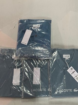 Camisa Lacoste color azul claro/ Talla M