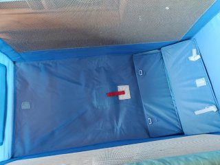 Cuna de viaje azul