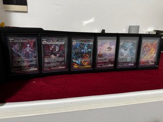 Raccoglitore magnetico carte Pokemon