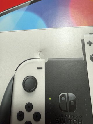 Nintendo Switch OLED con controller e custodia