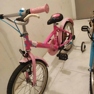 Bicicletas infantiles rosa y beige