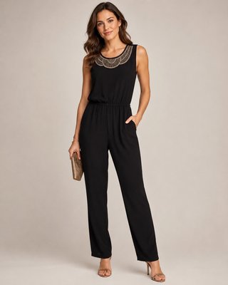 Mono negro elegante con pedrería