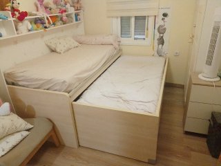 Cama nido beige y blanca