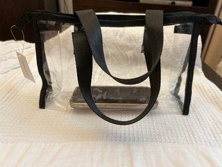 Bolso transparente con asas y cremallera