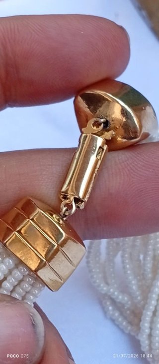 Collar de perlas con colgante