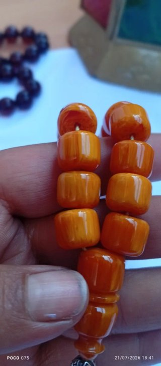 Rosario ámbar naranja y marrón