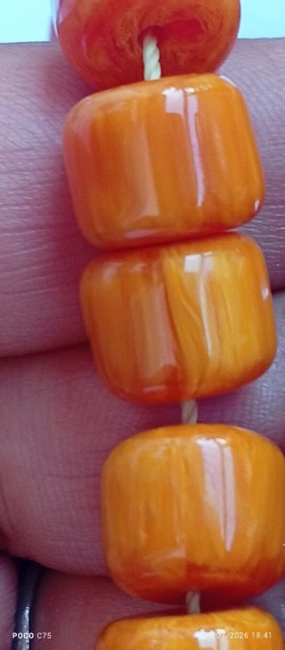 Rosario ámbar naranja y marrón