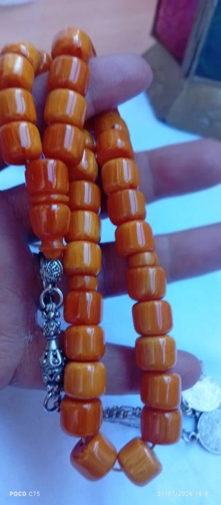 Rosario ámbar naranja y marrón