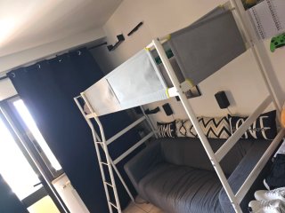 Divano e letto tessuto grigio