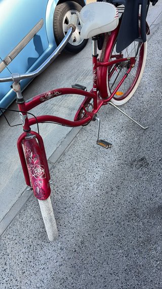 Bicicleta roja con silla para niño Con muy poco us