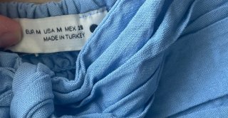 Mono azul con volantes