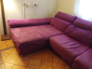 Sofá modular morado de tela
