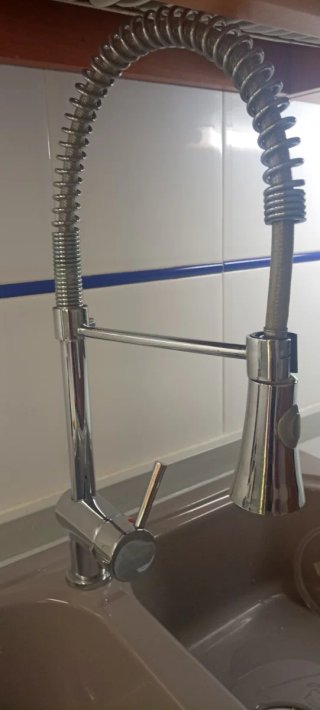 Campana extractora y grifo