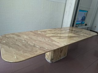 Mesa de comedor de mármol extensible