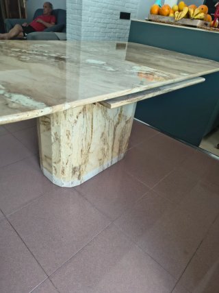 Mesa de comedor de mármol extensible