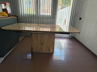 Mesa de comedor de mármol extensible