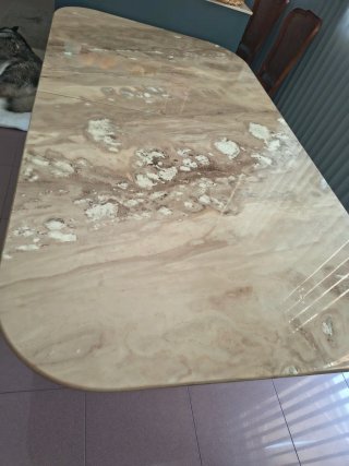 Mesa de comedor de mármol extensible