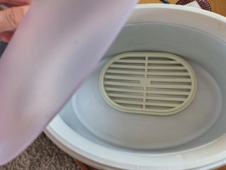 Fundidor de parafina rosa y blanco