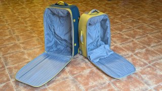 Maletas de viaje grandes azul y amarillo