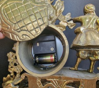 Orologio vintage decorativo in bronzo + candeliere