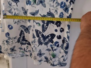 Blusa smanicata con farfalle e fiori