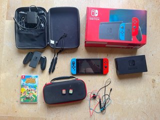 Nintendo Switch Rossa e Blu Completa