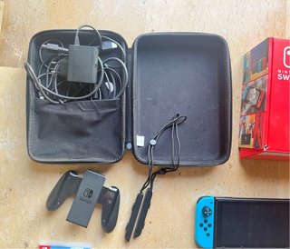 Nintendo Switch Rossa e Blu Completa