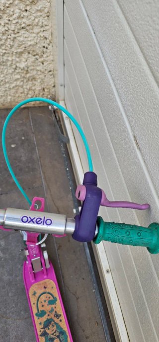 Patinete infantil morado y rosa