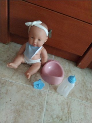 Muñeca bebé con accesorios