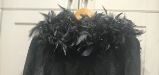 Chaqueta de punto con plumas