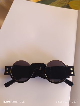 Occhiali da sole Balmain tondi neri e oro