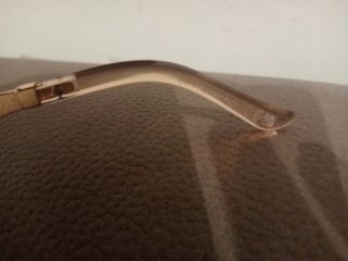 Gafas de sol doradas marrones