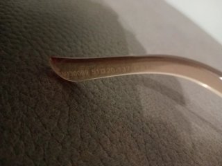 Gafas de sol doradas marrones