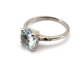 E1813223-0    Sortija Oro 18k Con Topacio