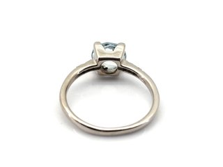 E1813223-0    Sortija Oro 18k Con Topacio