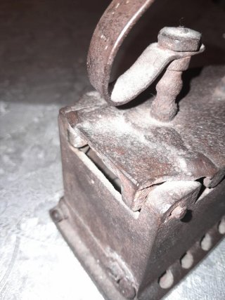 Antigua plancha de carbón