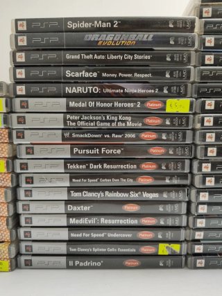 PSP 3000 Blu + 50 giochi + caricabatterie