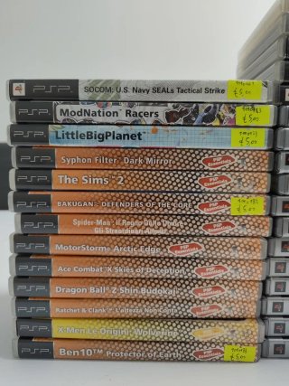 PSP 3000 Blu + 50 giochi + caricabatterie