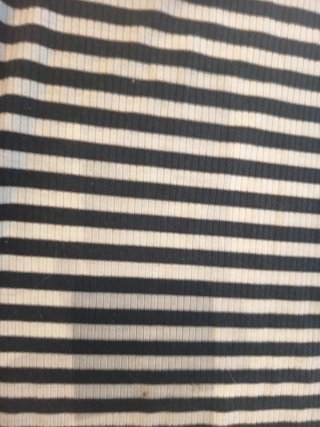 Jersey cuello alto rayas blanco y negro