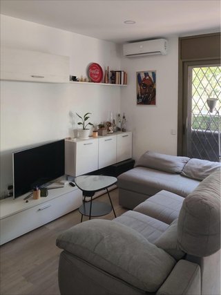 Sofá modular gris tela