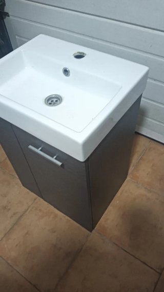 Lavabo con mueble y grifo